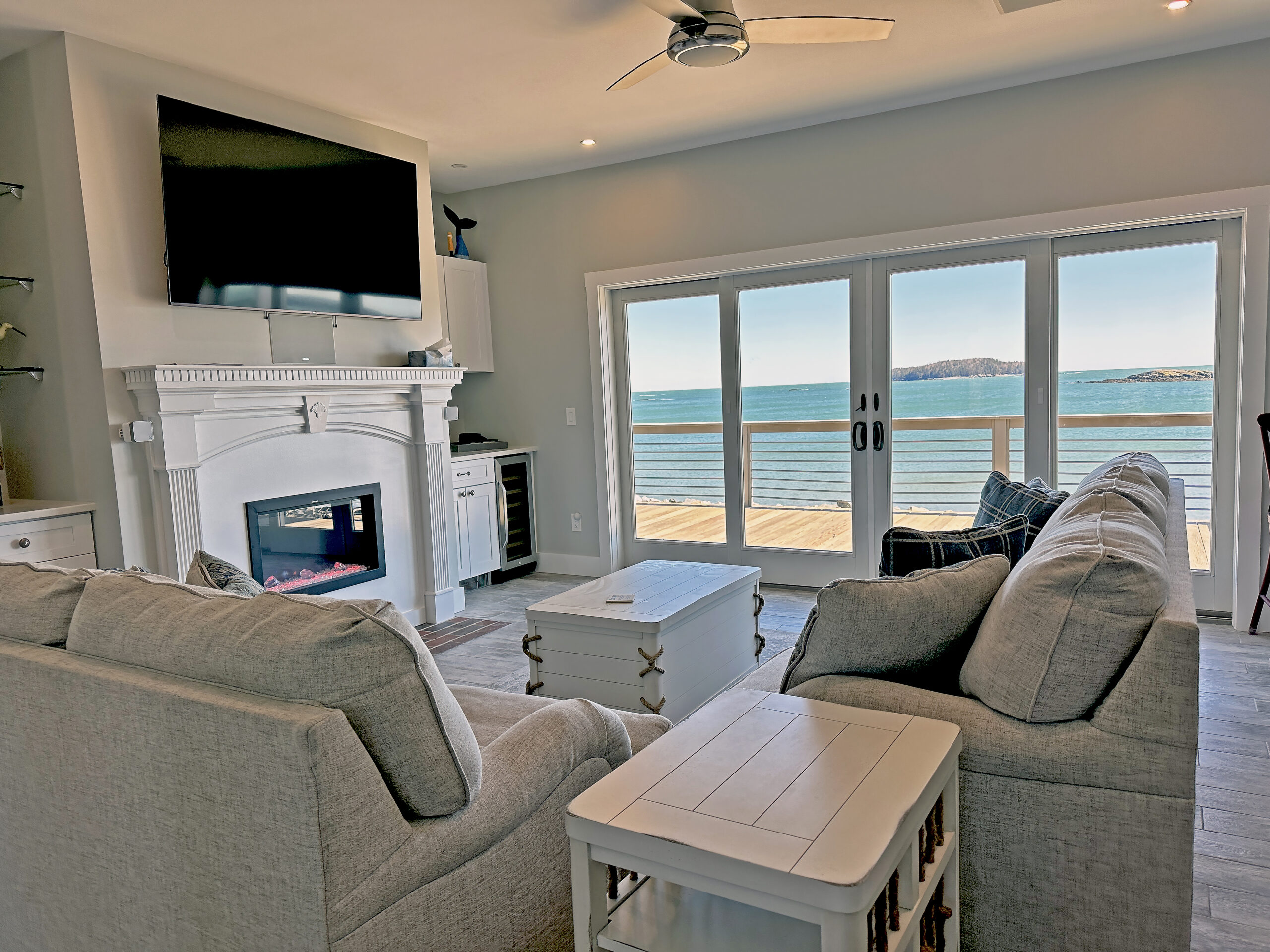 Electric Fireplace and ocean views - Sea Duck Cottage Maine